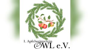 Fichtenkranz umgibt Apfelzweig mit Blüten und reifen Äpfeln, darunter "1. Apfelweinverein OWL e.V